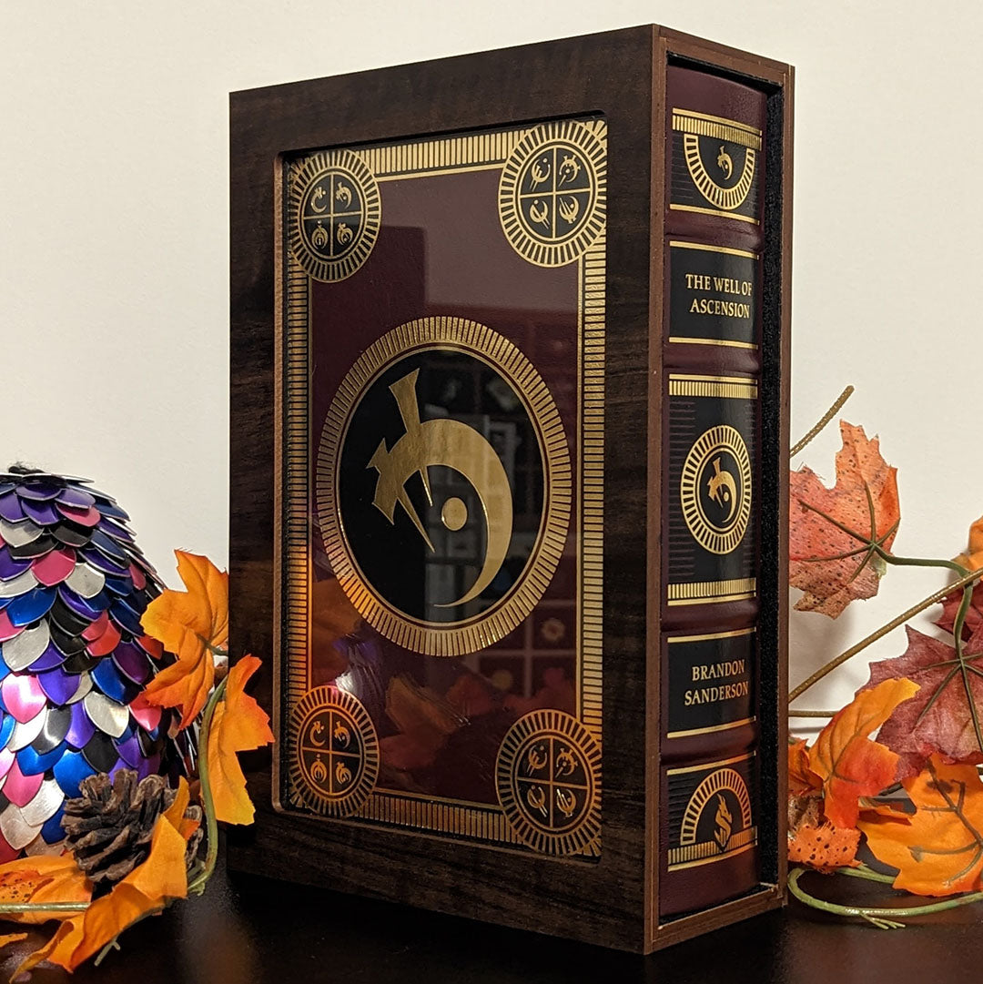 Custom size book display case by Dragon Woodshop showcasising Mistborn Well of Ascension Leatherbound by Brandon Sanderson