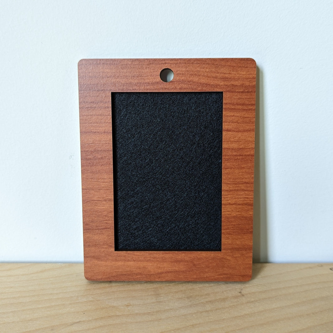 simple reversible pin display for up to 2 inch enamel pins, handmade wooden pin frame, featuring year of sanderson cosmere character pins