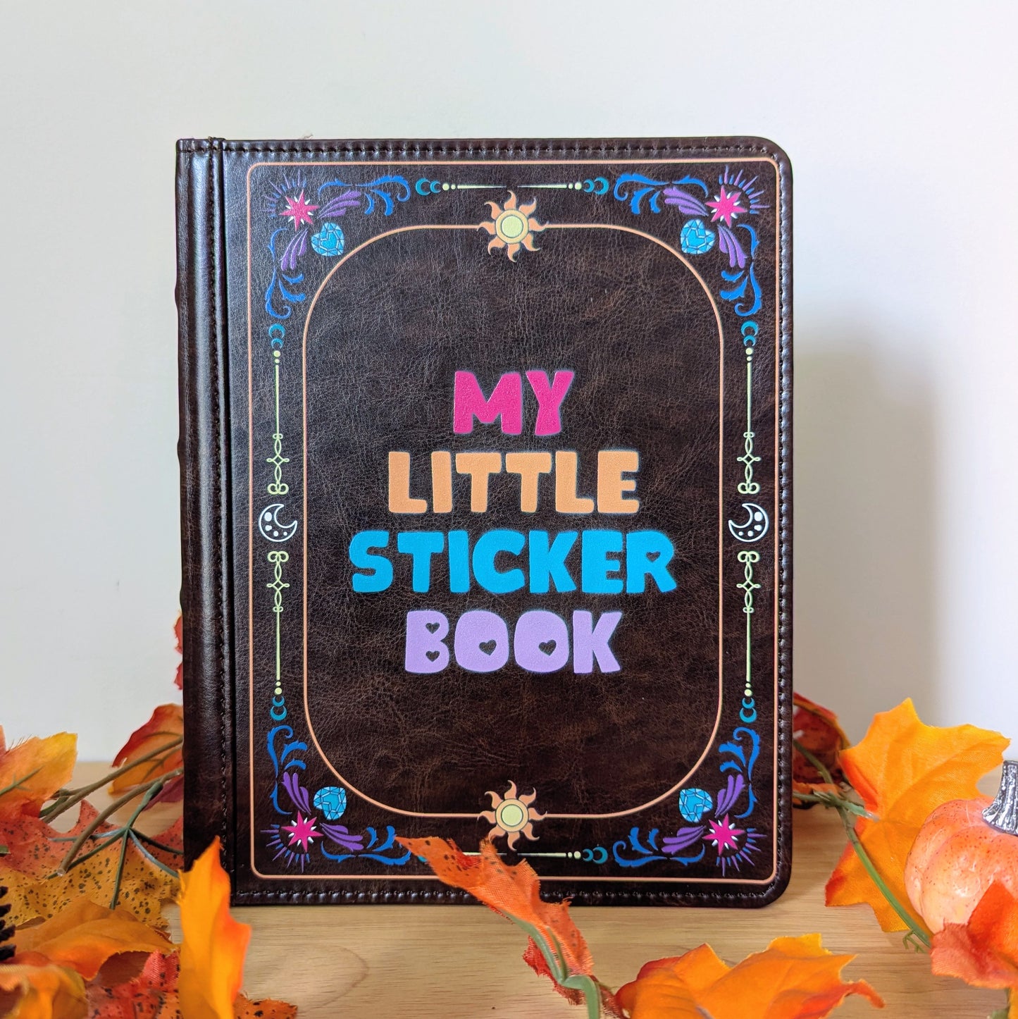 reusable sticker album for sticker collectors, brandon sanderson stickers, cosmere stickers, pixie and brutus stickers, my little pony friendship is magic