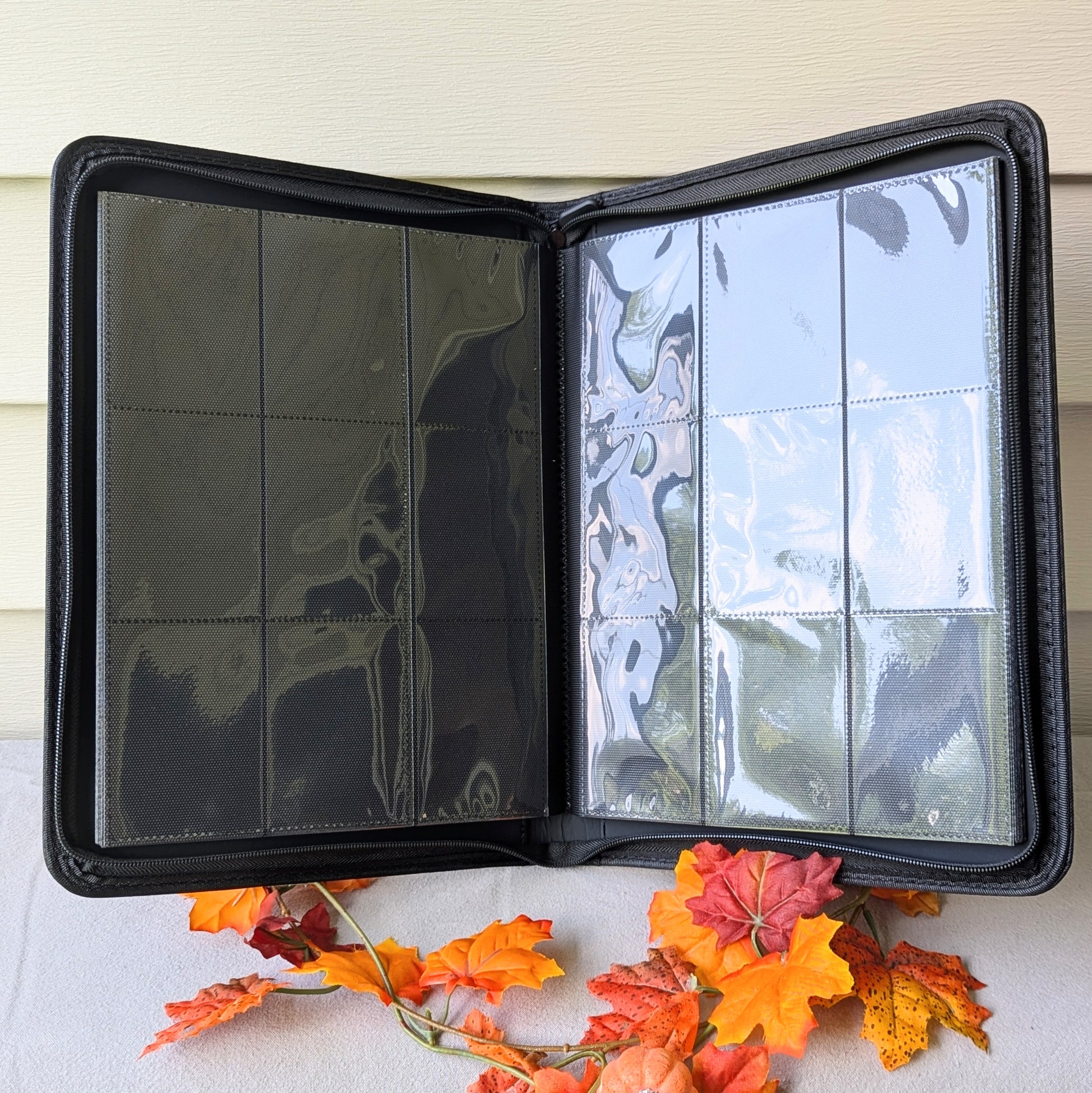 interior photo of the bound and the broken by Ryan Cahill collectible trading Patreon cards binder by dragon woodshop the order lorian empire Valtara wyvern