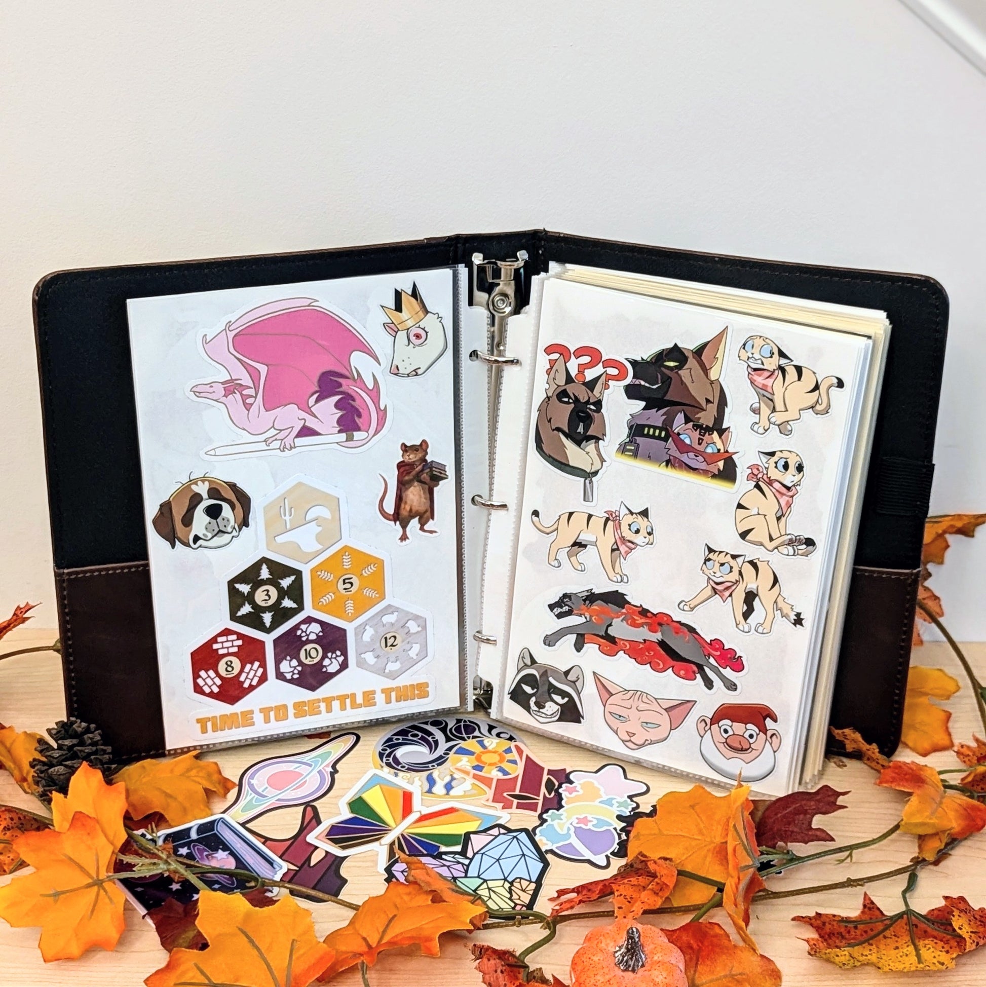 reusable sticker album for sticker collectors, brandon sanderson stickers, cosmere stickers, pixie and brutus stickers