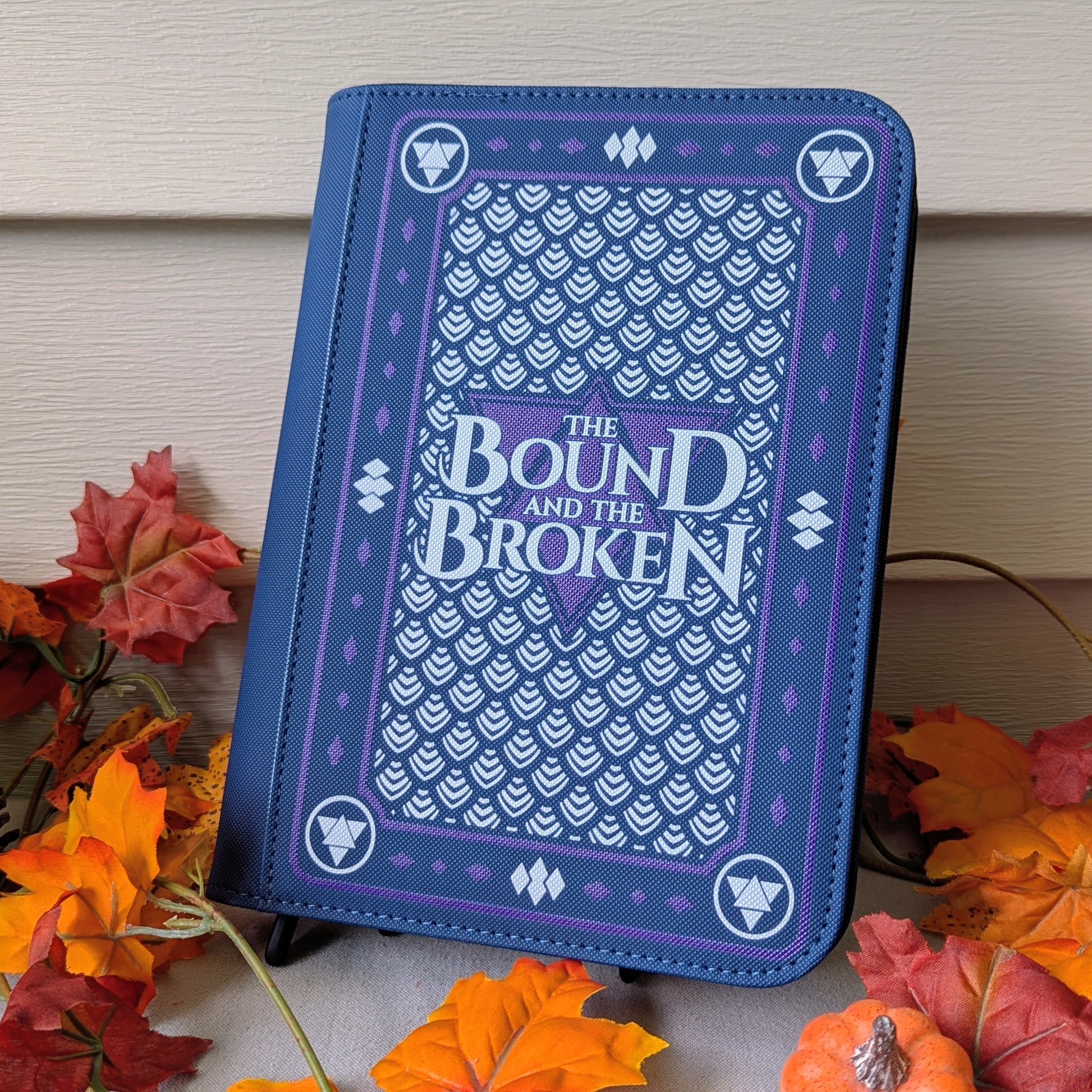 The bound and the broken by Ryan Cahill collectible trading Patreon cards binder by dragon woodshop