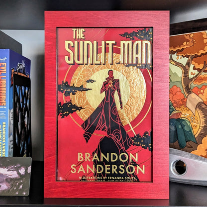 display cases for brandon sanderson's secret project novels tress, frugal wizard, yumi, and sunlit man