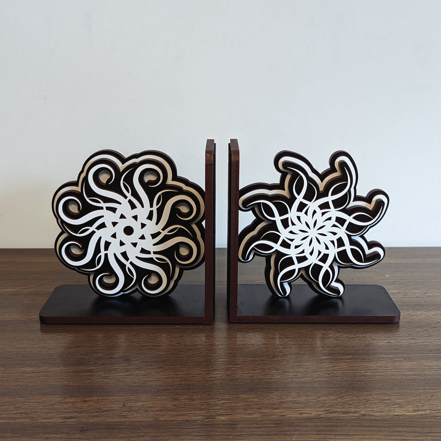 wooden bookends inspired by lightweaver cryptics spren from brandon sanderson stormlight archive