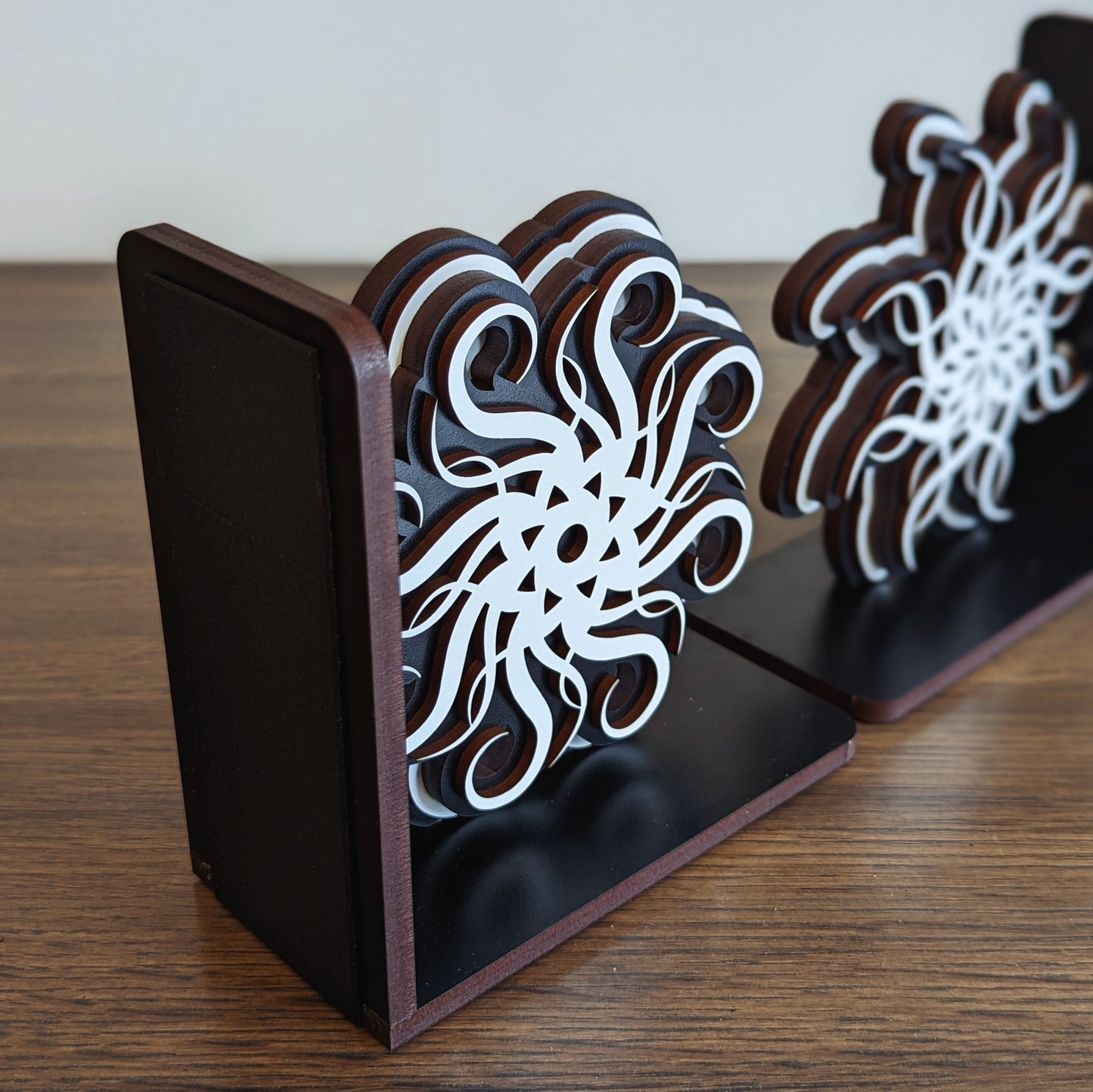 wooden bookends inspired by lightweaver cryptics spren from brandon sanderson stormlight archive