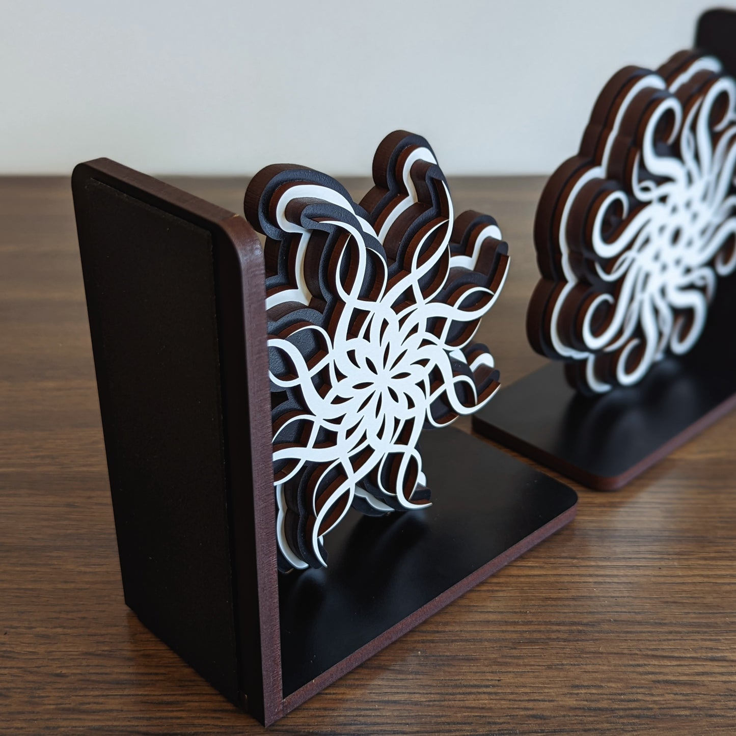 wooden bookends inspired by lightweaver cryptics spren from brandon sanderson stormlight archive