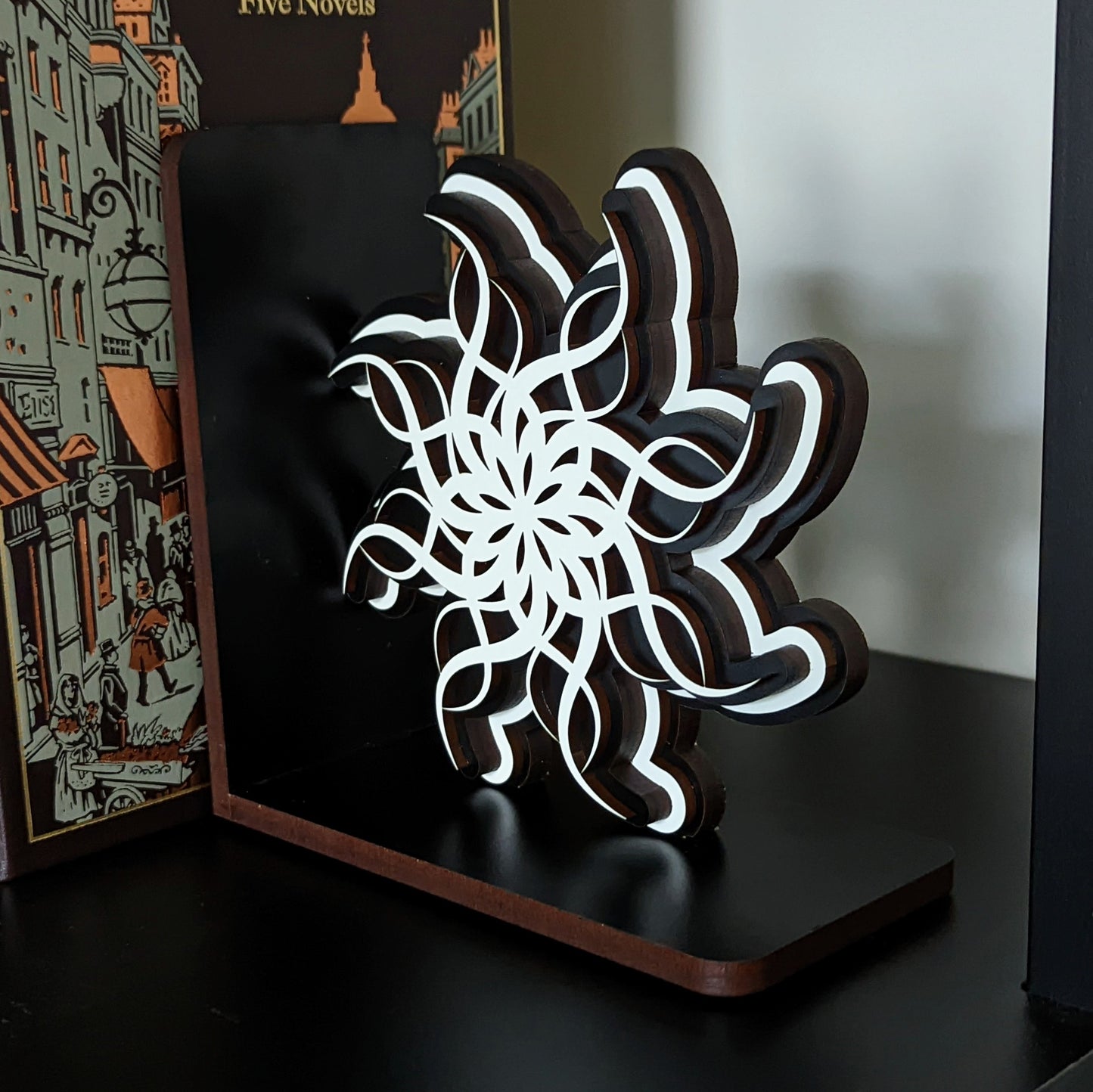 wooden bookends inspired by lightweaver cryptics spren from brandon sanderson stormlight archive