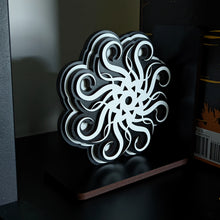 Load image into Gallery viewer, swirling thought decorative handmade wooden bookends inspired by cryptics from brandon sanderson stormlight archive
