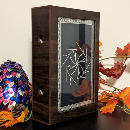 Custom size book display case by Dragon Woodshop showcasising Elantris Leatherbound by Brandon Sanderson